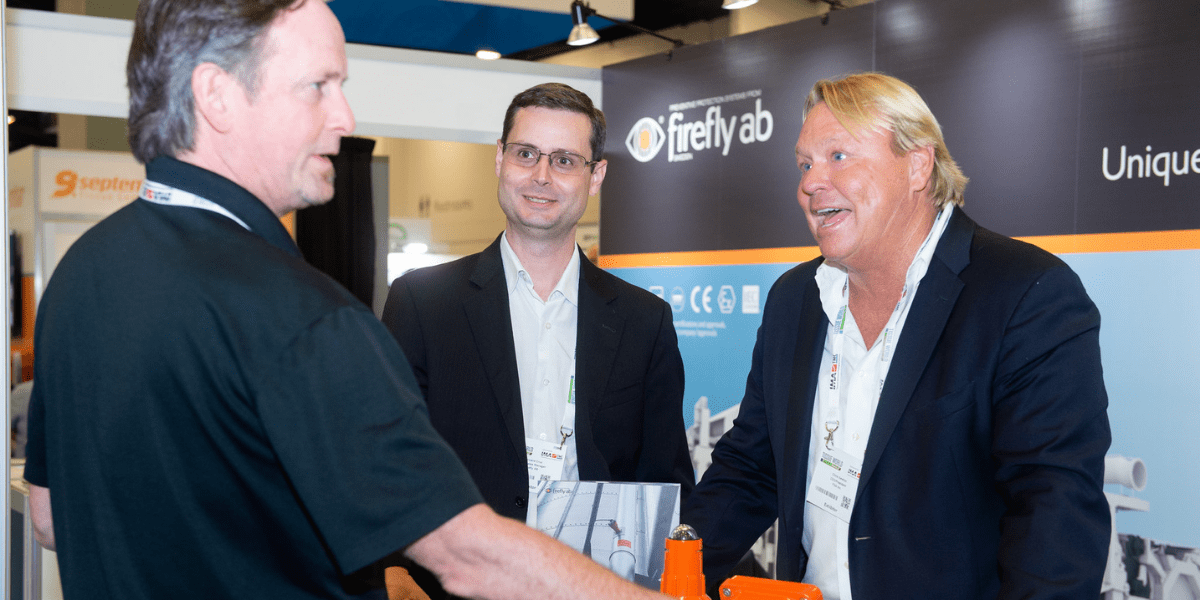 Exhibitors and Visitors Laughing at Tissue World Miami
